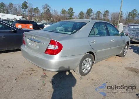 2002 Toyota Camry Le z USA, uszkodzony, nr VIN 4T1BE32K82U095120